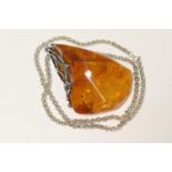 Large Polish Baltic amber pendant necklace, the amber stone approx. 75mm x 55mm, with a maximum