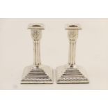 Pair of Victorian silver dwarf candlesticks, by Edward Hutton, London 1892, with removable nozzle