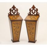 Pair of mahogany and inlaid candle boxes, in the Georgian style, each with a sloping top and panel