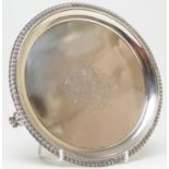 George III silver card tray, by William Shard, London 1817, circular form centred with a crest and