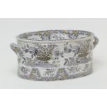 Spode printware footbath, circa 1820-40, twin handled oval form decorated with flower baskets in a