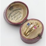 Victorian gem set trinity ring, hallmarked Birmingham 1886, having three conjoined rings set with