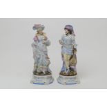 Pair of French coloured bisque figures of courtiers, circa 1900, decorated throughout with