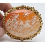 Victorian carved shell cameo brooch, carved as Phoebus and the Hours preceded by Aurora, after Guido