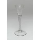 George III opaque airtwist cordial glass, circa 1770, moulded trumpet bowl with foliate engraving,