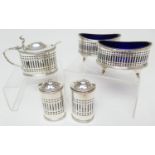 Edwardian silver five piece condiment, by Stokes and Ireland Ltd, Chester 1909, in the Adam