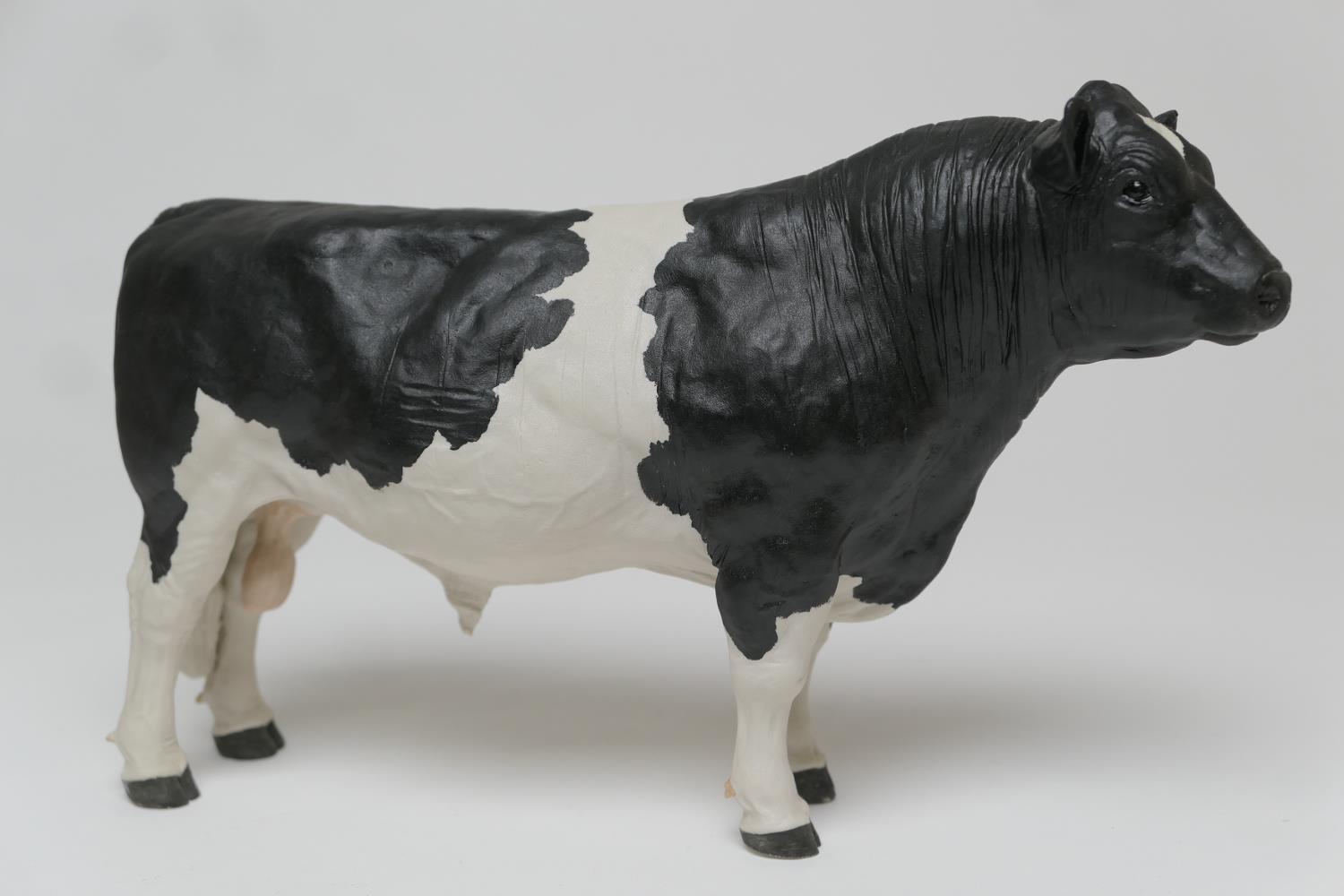 John Harper for Shebeg Pottery, Isle of Man, a Friesian bull, painted mark 'Harper Shebeg I.O.M.',