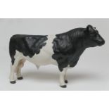 John Harper for Shebeg Pottery, Isle of Man, a Friesian bull, painted mark 'Harper Shebeg I.O.M.',