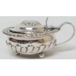 George IV silver wet mustard pot, maker C.F., London 1820, with domed cover, foliate collar over