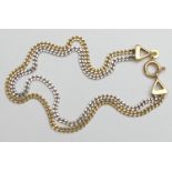 18ct two colour gold double strand curb link bracelet, with ring clasp, retailed by Boodle &