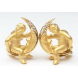 Pair of 18ct gold diamond cherub moon earrings, each set with small brilliants with a matte and