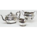 George III silver composite tea service, comprising bombe teapot with hinged cover, raised on ball