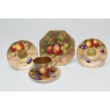 Royal Worcester fruit decorated cabinet china, comprising a demi-tasse cup and saucer by Moseley,