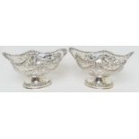Pair of Edwardian silver footed bonbon dishes, by Nathan & Hayes, Chester 1908/09, each pierced with