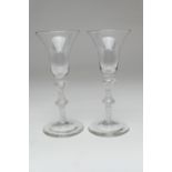 Pair of George II air twist wine glasses, circa 1750, with bell bowl, double knopped multi strand
