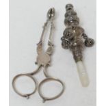 Victorian silver and mother of pearl baby's rattle, Birmingham 1888, typical foliate chased form