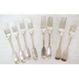 Silver fiddle pattern dessert forks, various makers and dates, comprising four by George Adams,