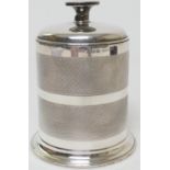 Art Deco silver cigarette dispenser, Birmingham 1936, engine turned cylinder form with rising cover,