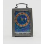 Archibald Knox (1864-1933) for Liberty & Co., a pewter and enamelled carriage clock, the case with