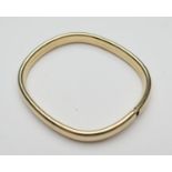 Continental 9ct gold hollow bangle, London import marks for 1986, interior size 6cm, weight