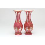 Pair of Bohemian clear and puce overlay glass vases, circa 1880, each of baluster form with