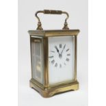 French brass chiming carriage clock, circa 1910, white enamel dial with Roman numerals, the movement