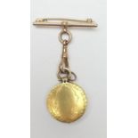 Unusual gold picture locket, formed from two George III guineas, hinged and centred with a locket