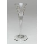 George II wine glass, circa 1740, trumpet bowl engraved with a foliate sprig, over a solid stem with
