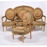 A set of settee and four fauteuils (armchairs)