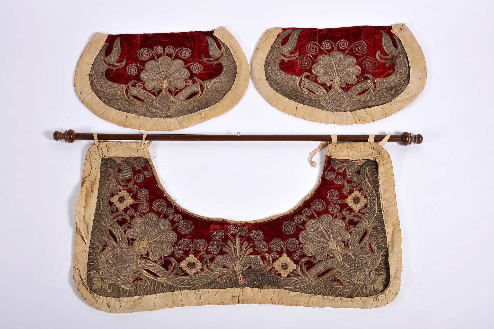 A saddle-cloth and a pair of two holsters hoods