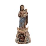 Our Lady with the Child Jesus on a cave with a kneeling Portuguese figure