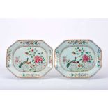 A pair of large octagonal platters