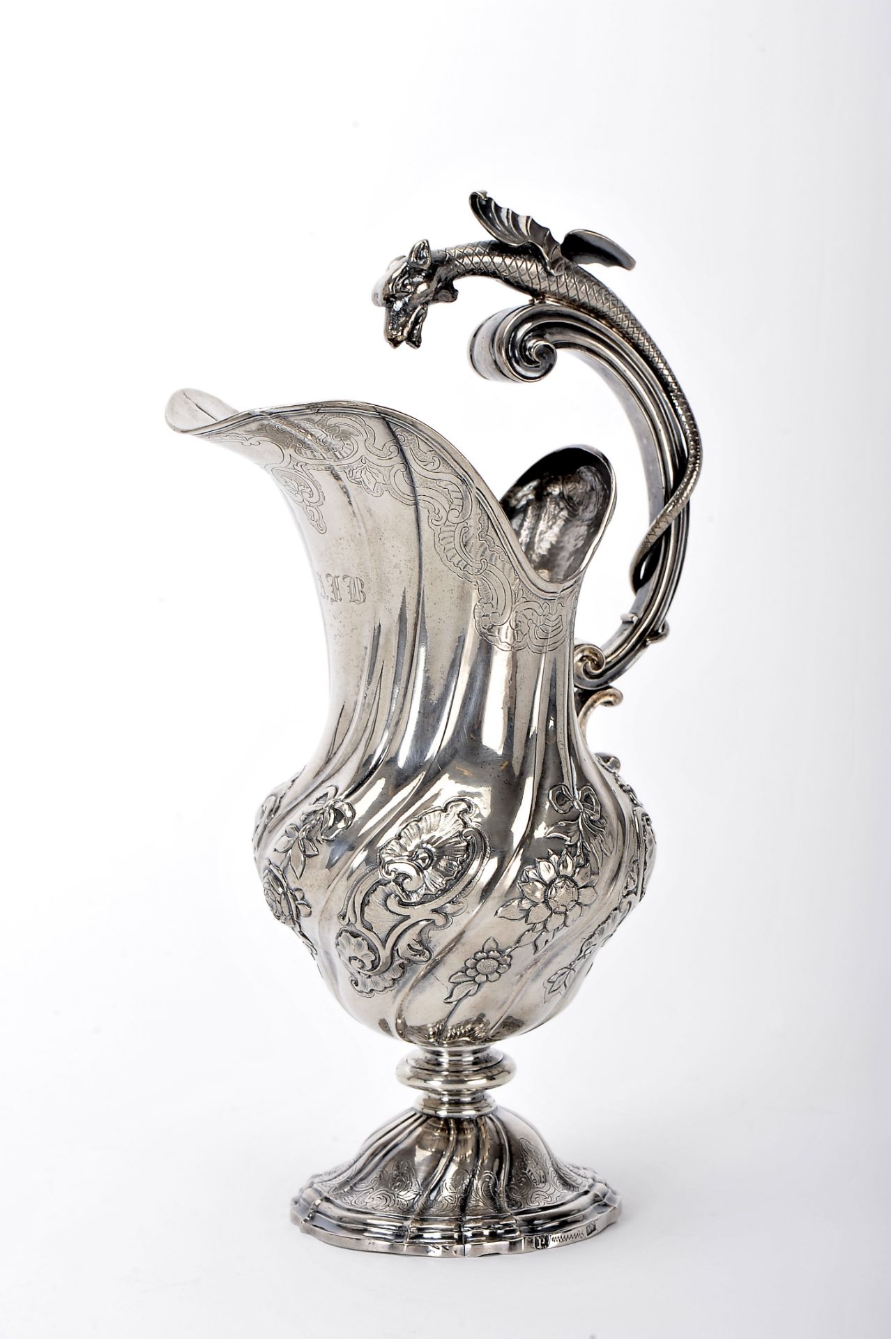 A ewer with open handle ending