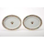 A pair of oval plates