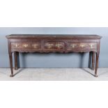 A Late 18th Century Dark Stained Pine Dresser Base, plain two plank top, fitted three frieze drawers