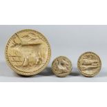 Three Carved Wood Butter Stamps, Victorian, carved with a standing cow, 4ins diameter, a running