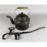 A Wrought Iron Kettle Tilt, 18th Century, with horseshoe hanger, and a Victorian cast iron 4 pint