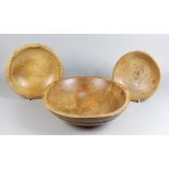 A Turned Sycamore Bowl, 19th Century, and Two Other Wooden Bowls, the sycamore bowl 14.25ins