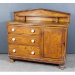A Late Victorian Grained as Oak Kitchen Chiffonier, the low angled back fitted one shelf, fitted