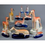 A Small Collection of Staffordshire Pottery Models of Greyhounds, 19th Century, including - standing