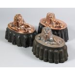 Three Copper and Tined Metal Oval Jelly Moulds, Victorian, each moulded with a recumbent lion, one