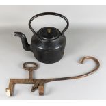 A Wrought Iron Kettle Tilt, 18th Century, with locking plate and upturned shepherds crook handle,