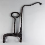 A Wrought Iron Kettle Tilt, 18th Century, of angular plough pattern with shaped handle