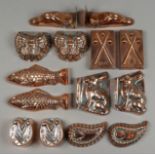 Seven Pairs of Copper Aspic Moulds, Late 19th Century, including a pair of Horseshoe moulds, 2ins,
