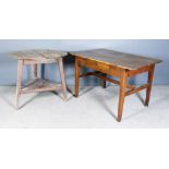 A 19th Century Pine Circular Cricket Table with scrubbed four plank top, on triangular splayed end