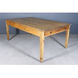 A Late Victorian Pine Kitchen Table with five plank top, fitted with a drawer to each end and on
