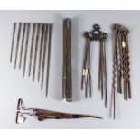 A Tin Cased Set of Nine Larding Needles, 10.5ins, six "Newman's Patent" steel twisted scewers,