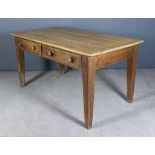 A Late Victorian Pine Kitchen Table with scrubbed five plank top on heavy square tapered legs, 59ins