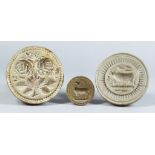 Three Carved Wood Butter Stamps, Victorian, carved with roses and leaves, 4.25ins diameter, a