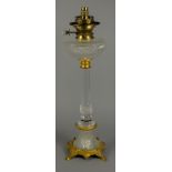 A Continental Gilt Brass and Cut Glass Oil Lamp, Late 19th Century, the reservoir and column diamond